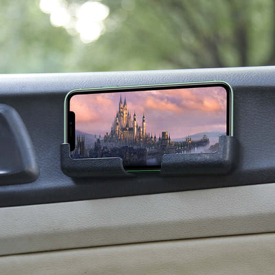 Mobile phone holder securely displaying navigation on car dashboard, showcasing adjustable design and convenience.
